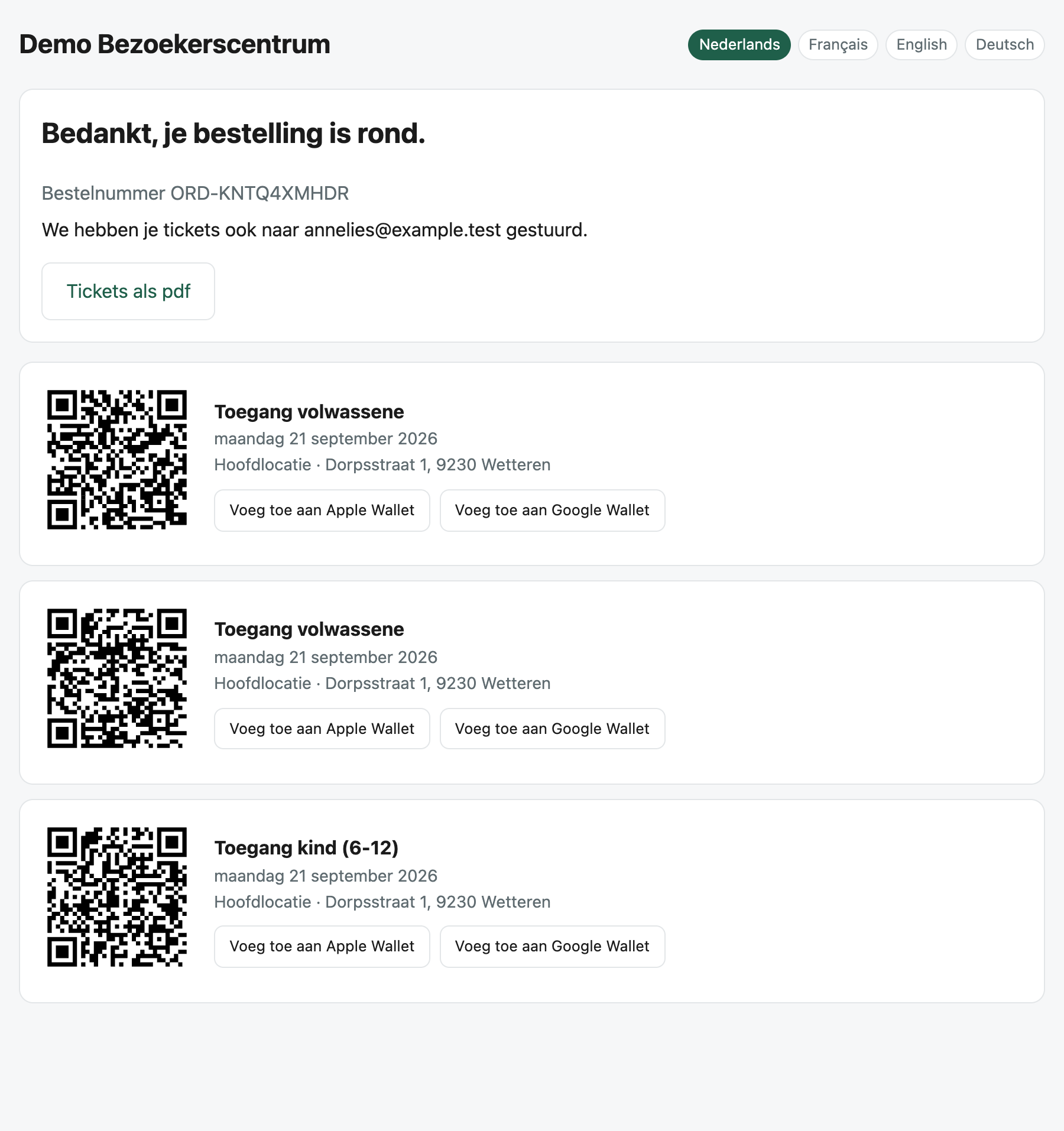 The confirmation page with two wallet buttons per ticket