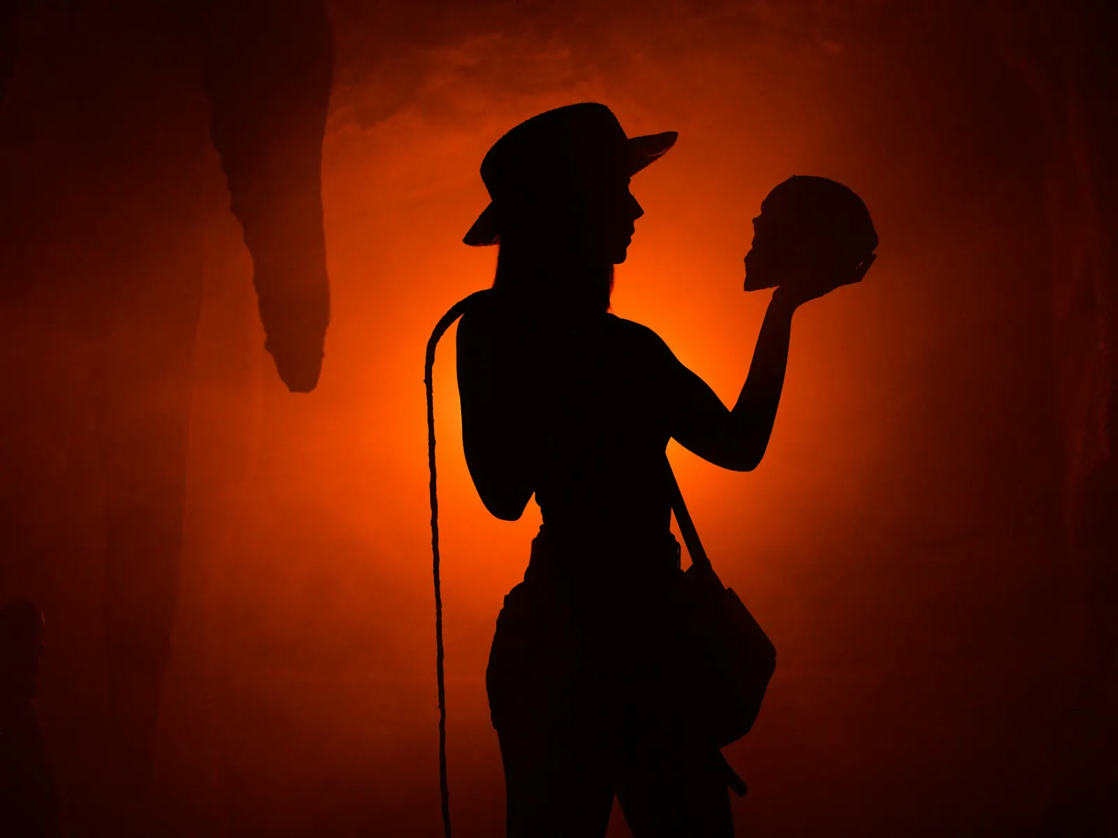 A singer backlit on a small stage